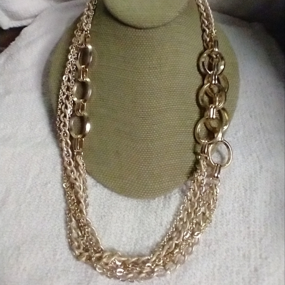 Goldtone circles long chain statement runway necklace